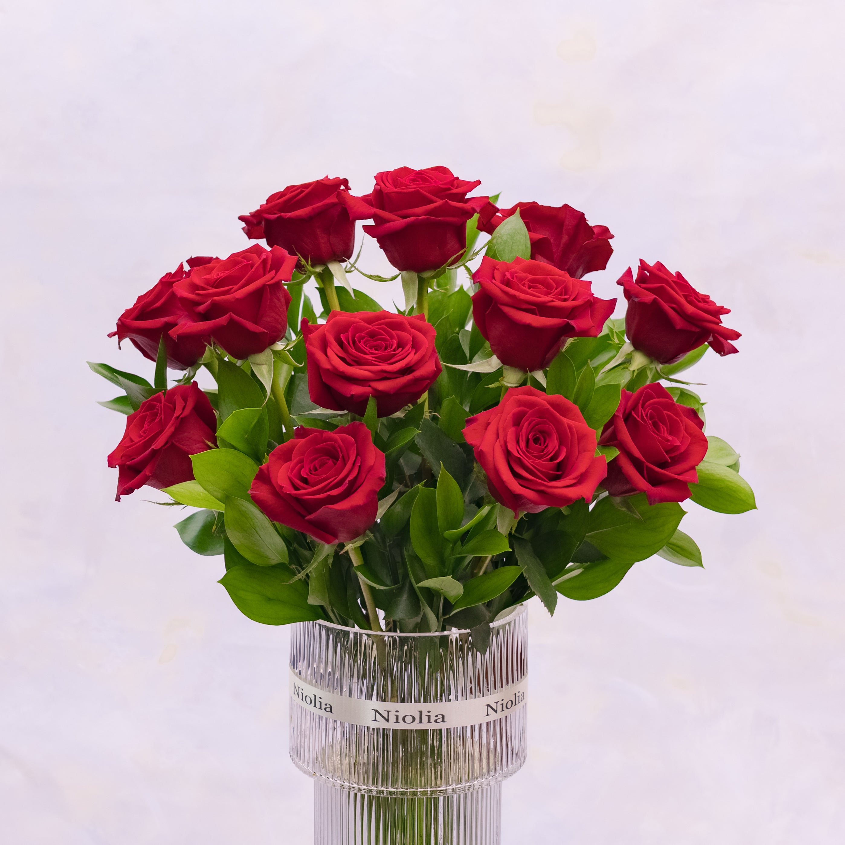 This timeless arrangement features one dozen premium red roses. Styled in Niolia’s refined classic aesthetic. Available for same-day flower delivery in San Francisco and surrounding Bay Area cities.