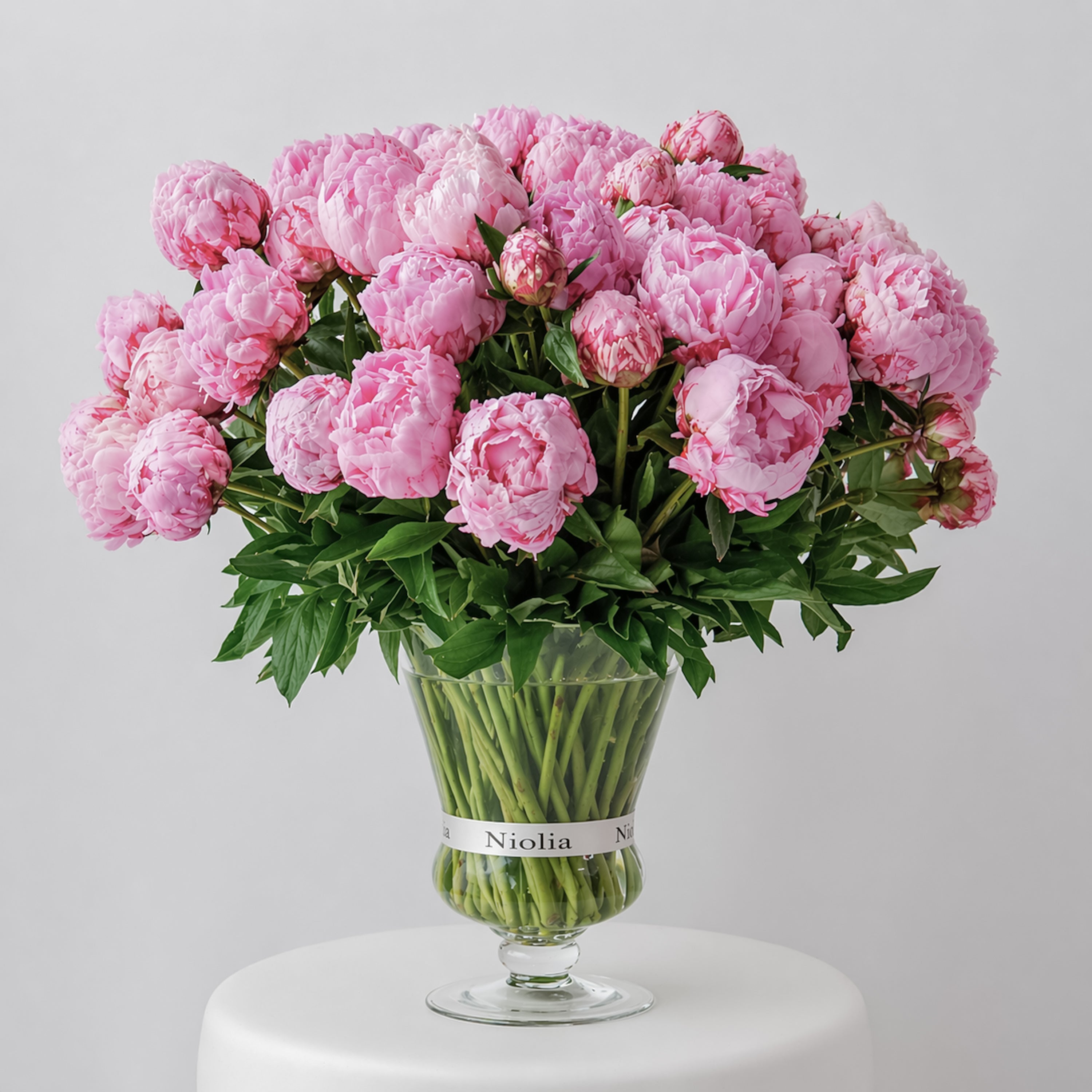 Pink Edit collection featuring pink tulip bouquets wrapped in black paper by Niolia, San Francisco florist