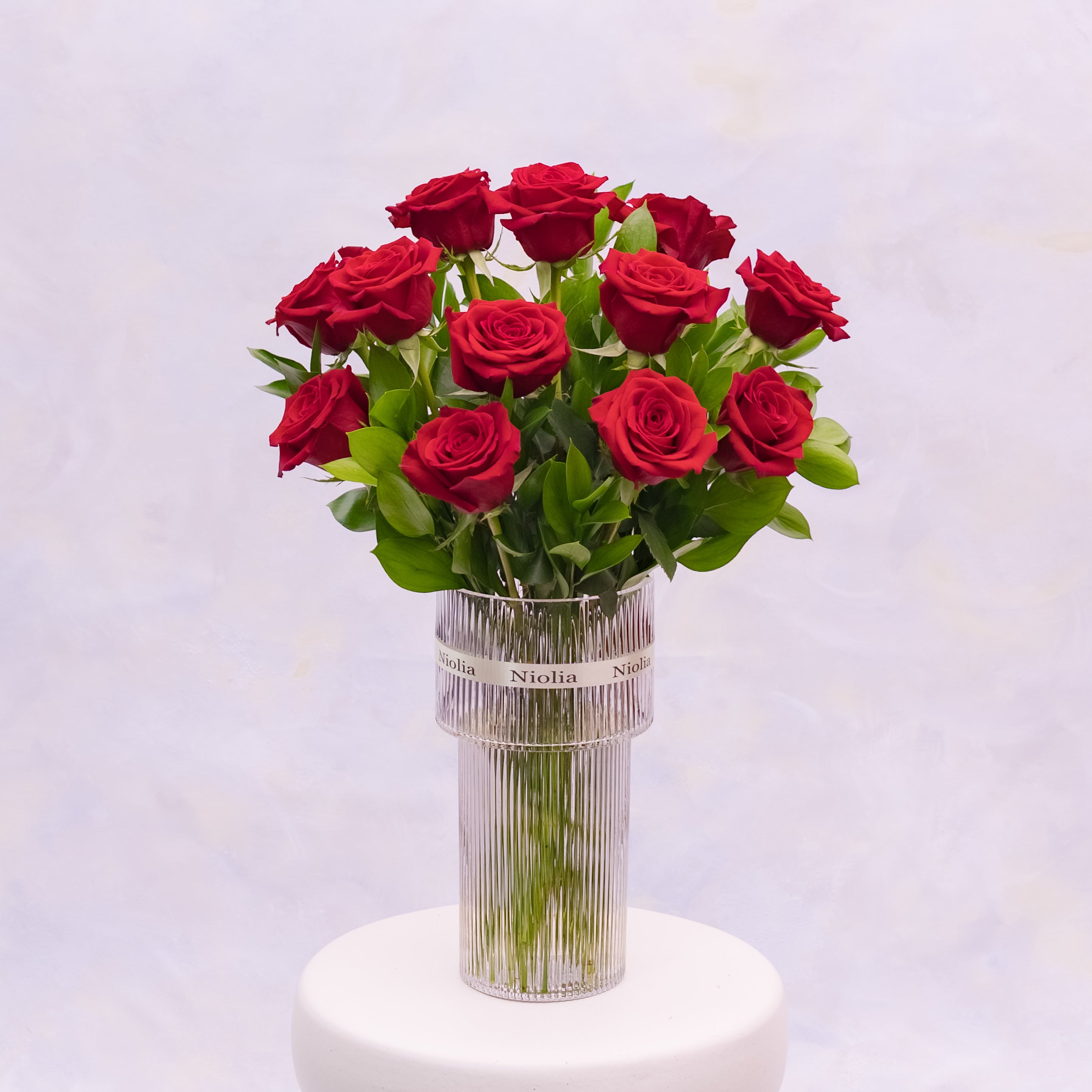 This timeless arrangement features one dozen premium red roses. Styled in Niolia’s refined classic aesthetic. Available for same-day flower delivery in San Francisco and surrounding Bay Area cities.
